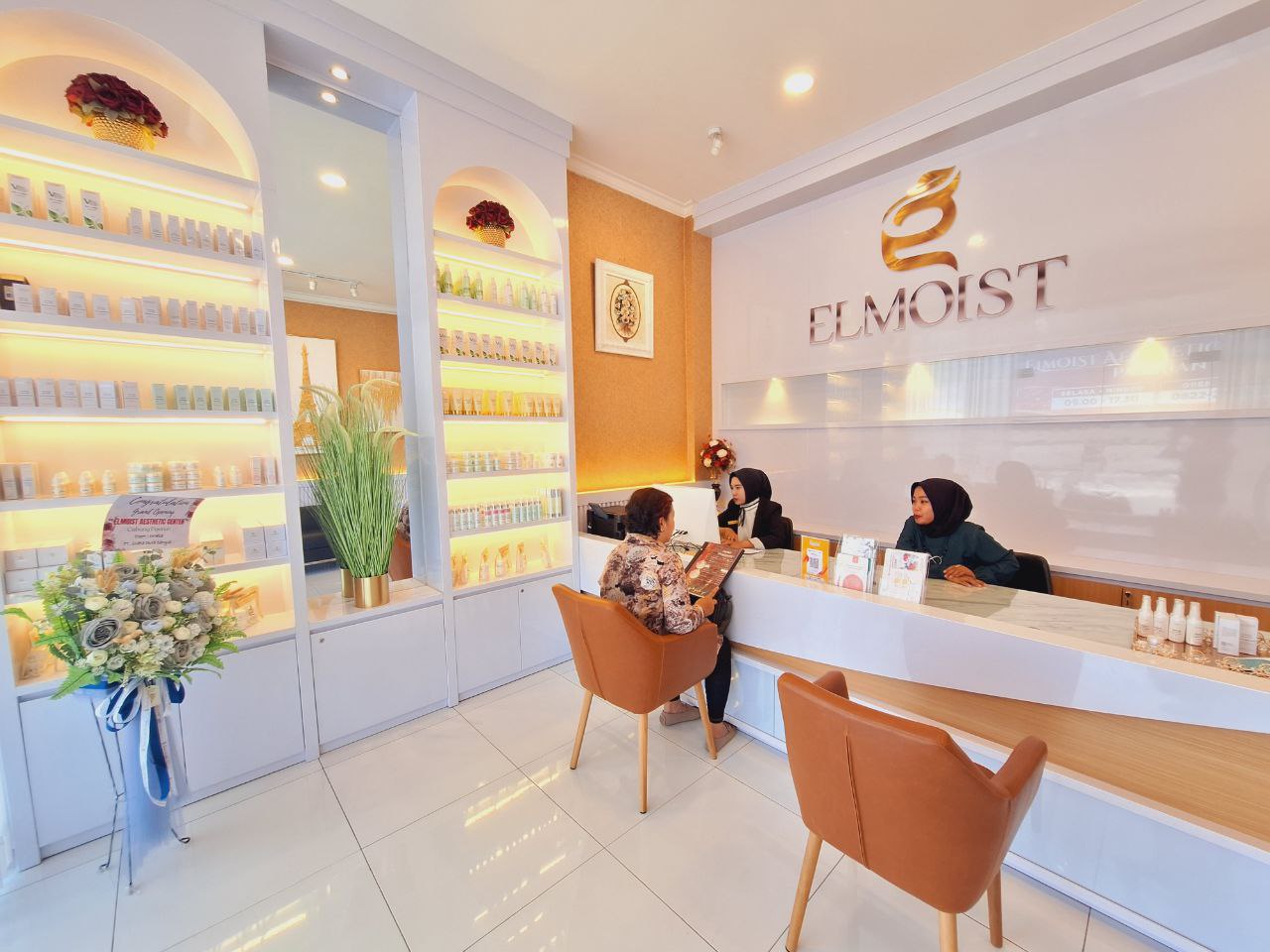 Elmoist Pasirian reception with full skincare wall display